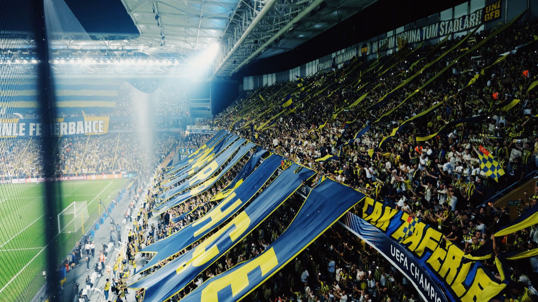 Football fans and matchday atmosphere in a packed stadium